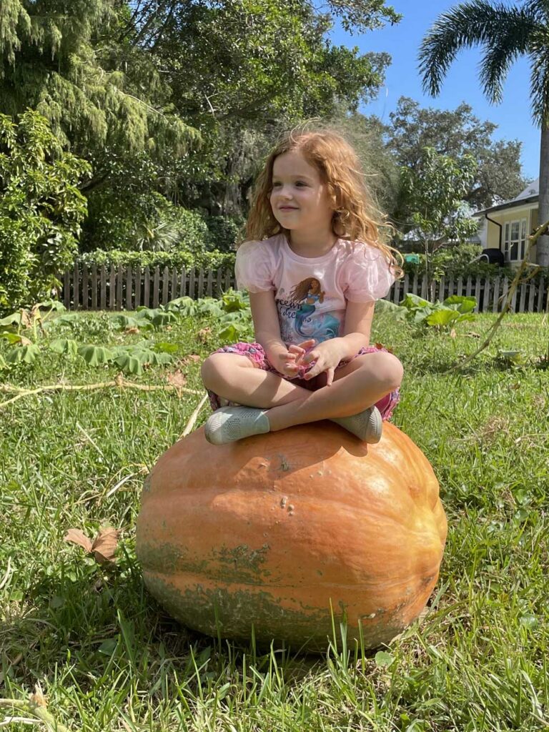 Girl and her pumpkin