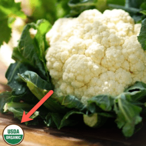 cauliflower with arrow pointing to organic label