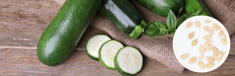 zucchini squash cut on table with seeds