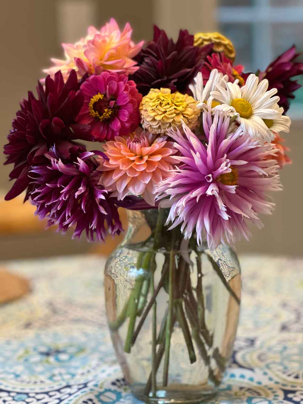 bouquet of dahilas in glass vase